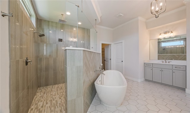 bathroom featuring a soaking tub, a walk in shower, vanity, and crown molding