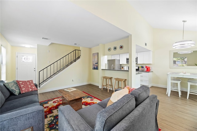 living room featuring light wood-type flooring