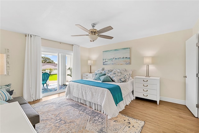 bedroom with light wood-type flooring, ceiling fan, and access to exterior