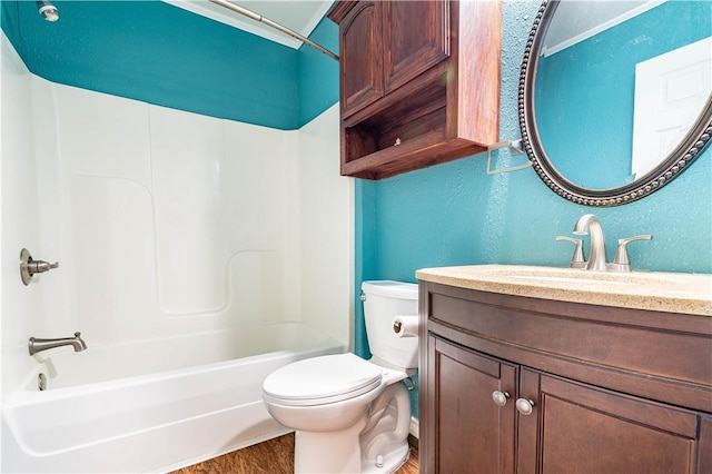 5905 Norvel Dr, Corpus Christi, TX 78412 - bathroom featuring vanity, wood finished floors, shower / bath combination, and a textured wall