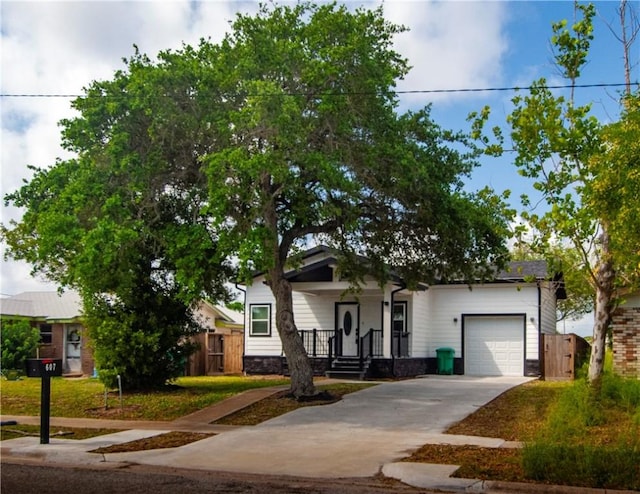 607 Matlock, Aransas Pass, TX 78336 - view of front of house featuring a garage and driveway