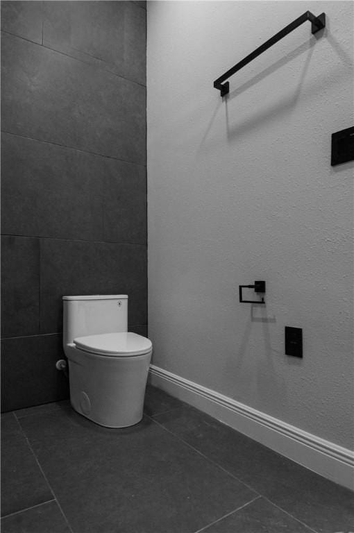 607 Matlock, Aransas Pass, TX 78336 - bathroom with toilet and tile patterned flooring