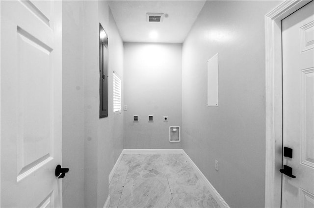 607 Matlock, Aransas Pass, TX 78336 - washroom with electric dryer hookup, marble finish floors, washer hookup, and baseboards