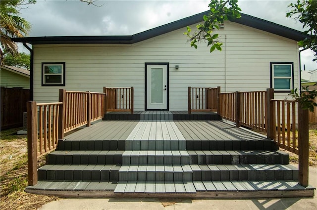 607 Matlock, Aransas Pass, TX 78336 - back of property with a wooden deck