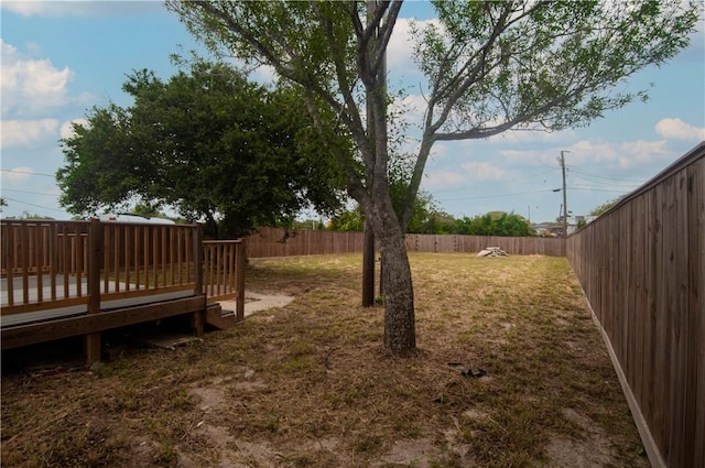607 Matlock, Aransas Pass, TX 78336 - view of yard featuring a wooden deck