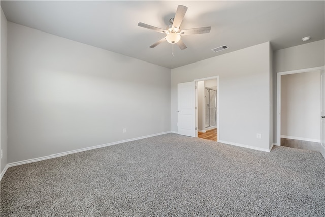 unfurnished bedroom featuring ceiling fan and light colored carpet