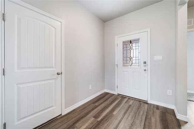 entrance foyer with dark hardwood / wood-style flooring