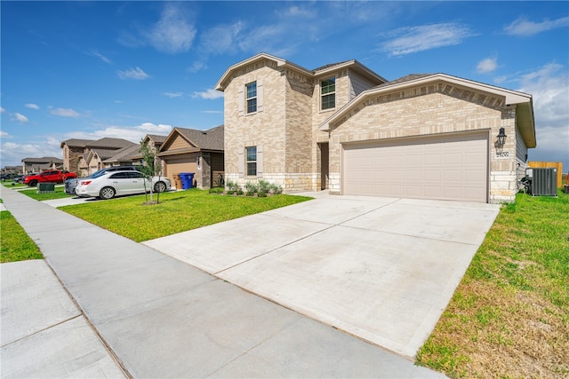 view of front of property featuring a garage, a front lawn, and cooling unit