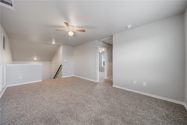 bonus room with carpet flooring, ceiling fan, and lofted ceiling