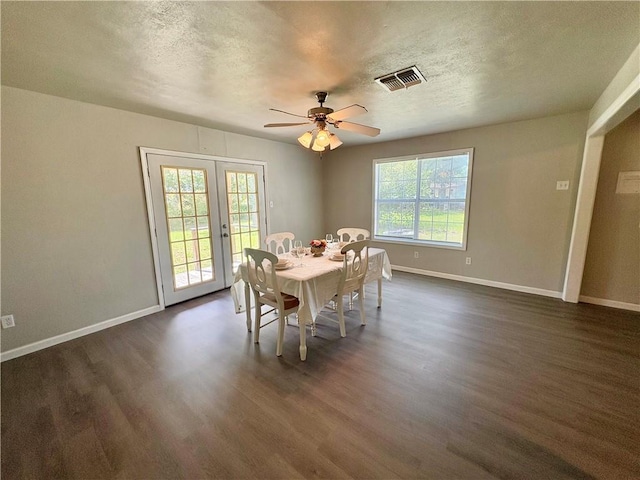 1230 Dona, Corpus Christi, TX 78407 - dining space featuring dark wood-style floors, a ceiling fan, a textured ceiling, and french doors