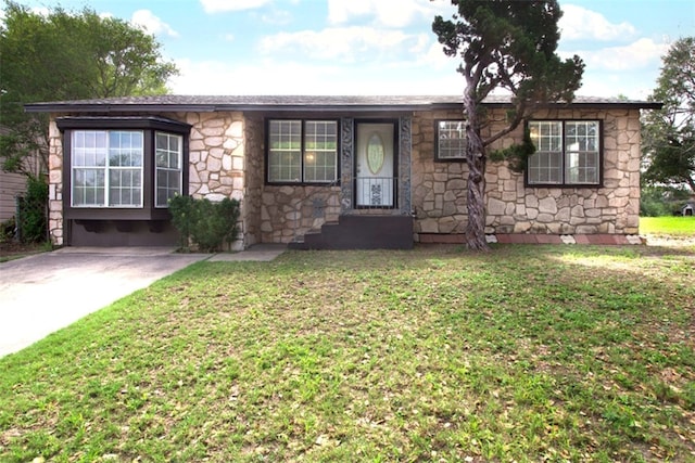1230 Dona, Corpus Christi, TX 78407 - single story home featuring stone siding and a front lawn