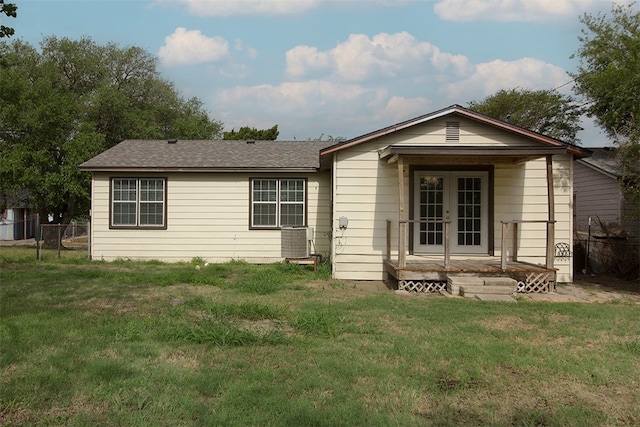 1230 Dona, Corpus Christi, TX 78407 - view of front of home featuring french doors and a shingled roof