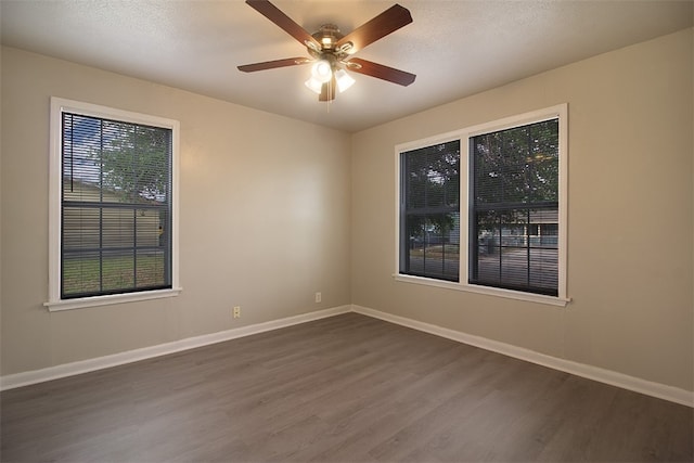 1230 Dona, Corpus Christi, TX 78407 - spare room with dark wood-style flooring and ceiling fan