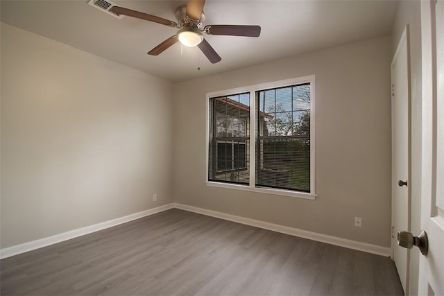 1230 Dona, Corpus Christi, TX 78407 - empty room with wood finished floors and a ceiling fan