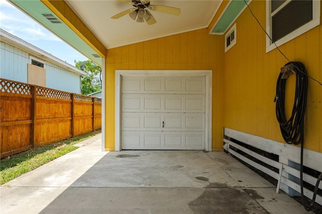 1003 S Pearl St, Rockport, TX 78382 - garage featuring ceiling fan and concrete driveway