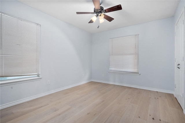 1003 S Pearl St, Rockport, TX 78382 - empty room with light wood-type flooring, baseboards, and a ceiling fan