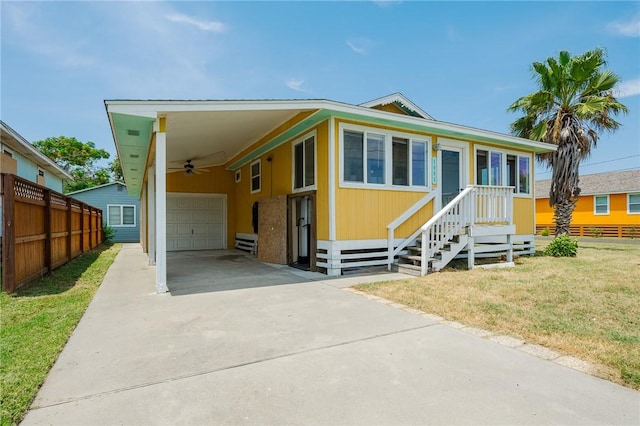 1003 S Pearl St, Rockport, TX 78382 - manufactured / mobile home with driveway and a garage