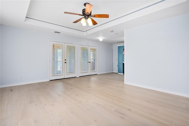 1003 S Pearl St, Rockport, TX 78382 - empty room featuring baseboards, light wood-type flooring, and ceiling fan