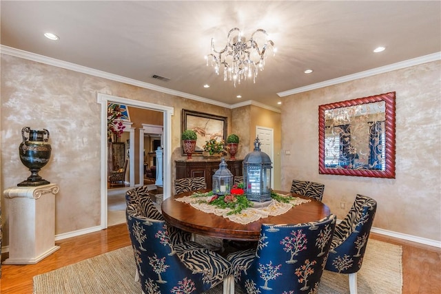 7001 Bevington Dr, Corpus Christi, TX 78413 - dining space with wood finished floors, a chandelier, baseboards, and recessed lighting