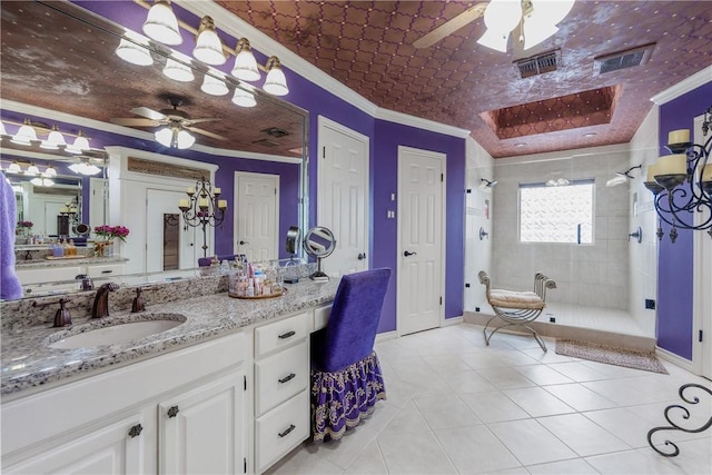 7001 Bevington Dr, Corpus Christi, TX 78413 - bathroom with ceiling fan, crown molding, a walk in shower, tile patterned floors, and vanity