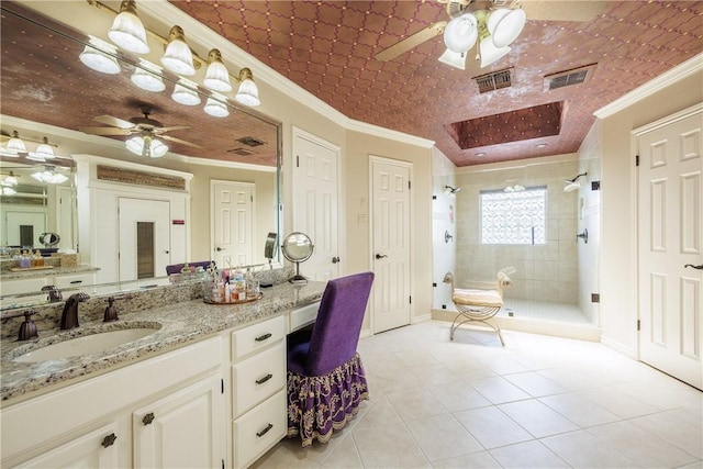 7001 Bevington Dr, Corpus Christi, TX 78413 - bathroom featuring ceiling fan, a stall shower, vanity, crown molding, and tile patterned floors