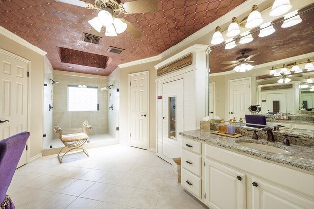 7001 Bevington Dr, Corpus Christi, TX 78413 - full bath featuring ceiling fan, a stall shower, crown molding, tile patterned flooring, and vanity