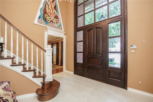 7001 Bevington Dr, Corpus Christi, TX 78413 - foyer entrance with a towering ceiling and stairs