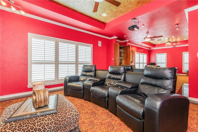 7001 Bevington Dr, Corpus Christi, TX 78413 - carpeted cinema with a raised ceiling, ceiling fan, crown molding, and baseboards