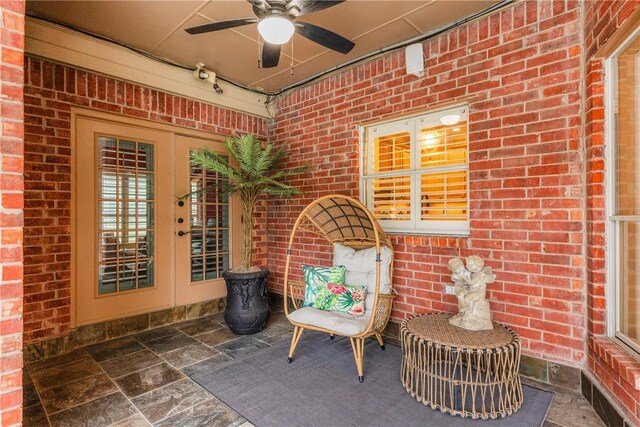 7001 Bevington Dr, Corpus Christi, TX 78413 - view of patio / terrace featuring a ceiling fan and french doors