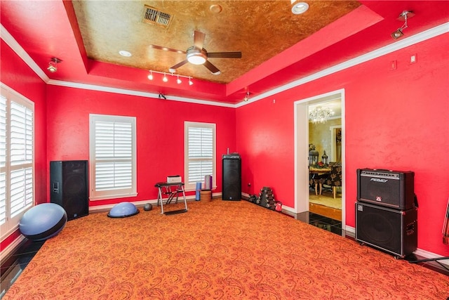 7001 Bevington Dr, Corpus Christi, TX 78413 - recreation room with a raised ceiling, ceiling fan, baseboards, track lighting, and ornamental molding