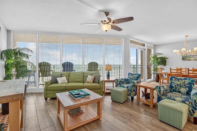 6649 Seacomber Dr Unit 807, Port Aransas, TX 78373 - sunroom / solarium featuring a chandelier
