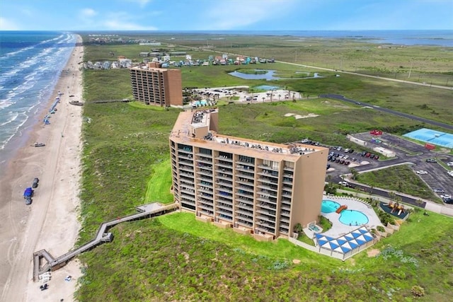 6649 Seacomber Dr Unit 807, Port Aransas, TX 78373 - drone / aerial view of waterfront with a beach and a pool area