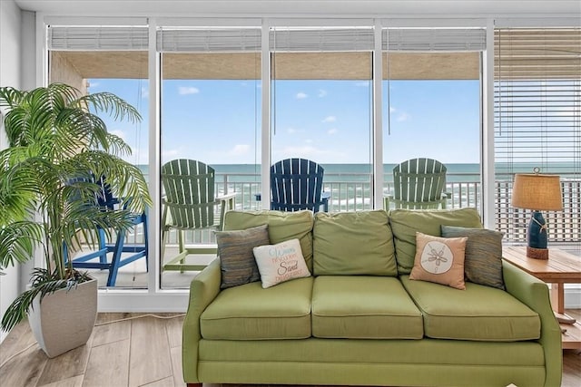 6649 Seacomber Dr Unit 807, Port Aransas, TX 78373 - living area with a water view and wood finished floors