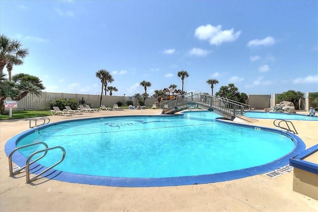 6649 Seacomber Dr Unit 807, Port Aransas, TX 78373 - community pool with a patio area