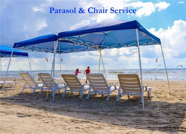 6649 Seacomber Dr Unit 807, Port Aransas, TX 78373 - view of jungle gym featuring view of water and beach