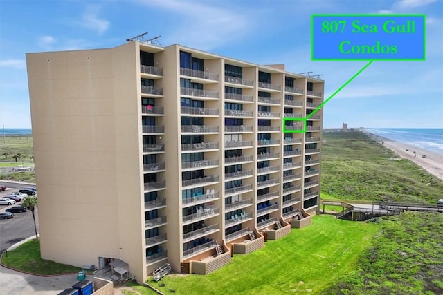6649 Seacomber Dr Unit 807, Port Aransas, TX 78373 - view of apartment building / complex with a water view