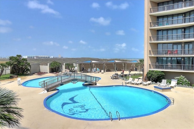6649 Seacomber Dr Unit 807, Port Aransas, TX 78373 - community pool featuring a patio area