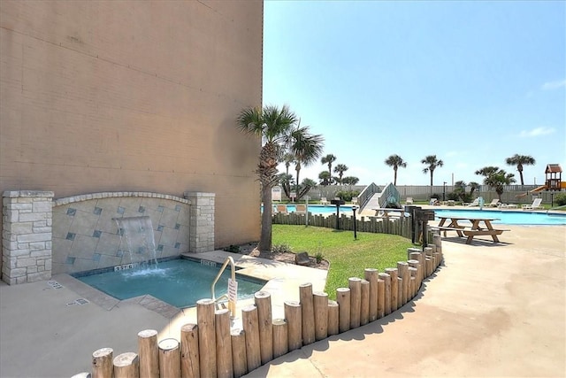 6649 Seacomber Dr Unit 807, Port Aransas, TX 78373 - community pool with a patio area