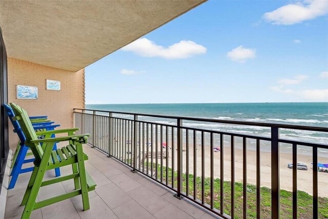 6649 Seacomber Dr Unit 807, Port Aransas, TX 78373 - balcony featuring view of water and beach