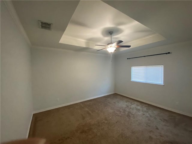 7618 Sable Creek Dr, Corpus Christi, TX 78414 - unfurnished room featuring a raised ceiling, ornamental molding, a ceiling fan, carpet floors, and baseboards