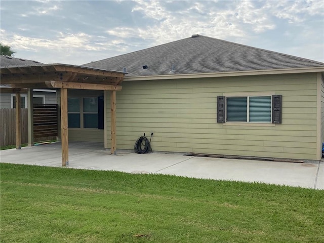 7618 Sable Creek Dr, Corpus Christi, TX 78414 - rear view of house featuring roof with shingles and a patio