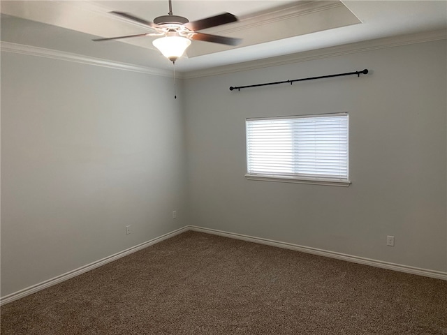 unfurnished room featuring carpet flooring, ceiling fan, and ornamental molding