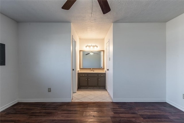 spacious closet featuring dark hardwood / wood-style flooring