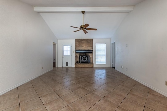 tiled living room featuring vaulted ceiling with beams, a fireplace, and ceiling fan