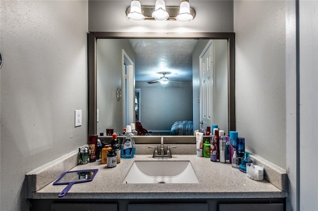 bathroom with vanity and ceiling fan