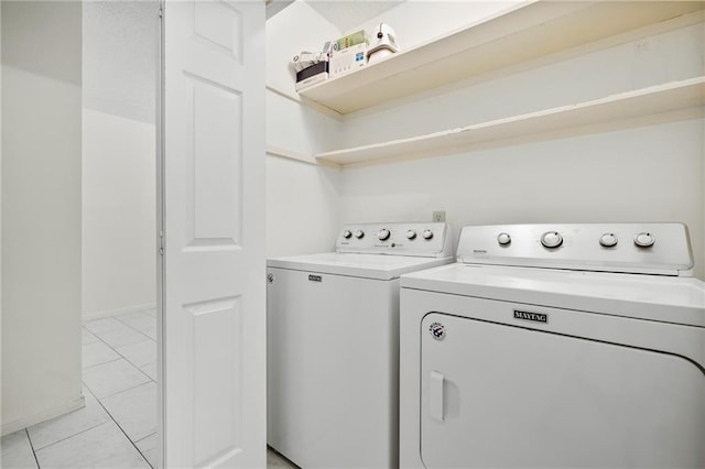 2991 Lakeview E Dr, Ingleside, TX 78362 - washroom with separate washer and dryer and light marble finish floors