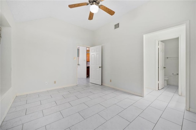 2991 Lakeview E Dr, Ingleside, TX 78362 - unfurnished bedroom featuring lofted ceiling, light tile patterned flooring, and ceiling fan