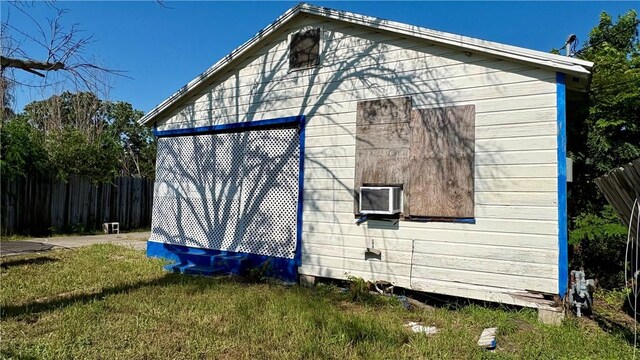 view of home's exterior with cooling unit