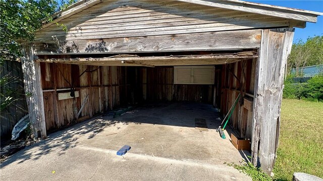 view of parking featuring a garage