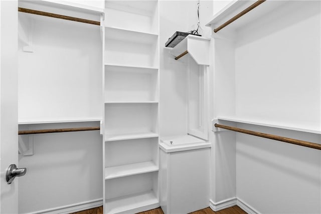 2718 Yeager Dr, Corpus Christi, TX 78410 - walk in closet featuring wood finished floors